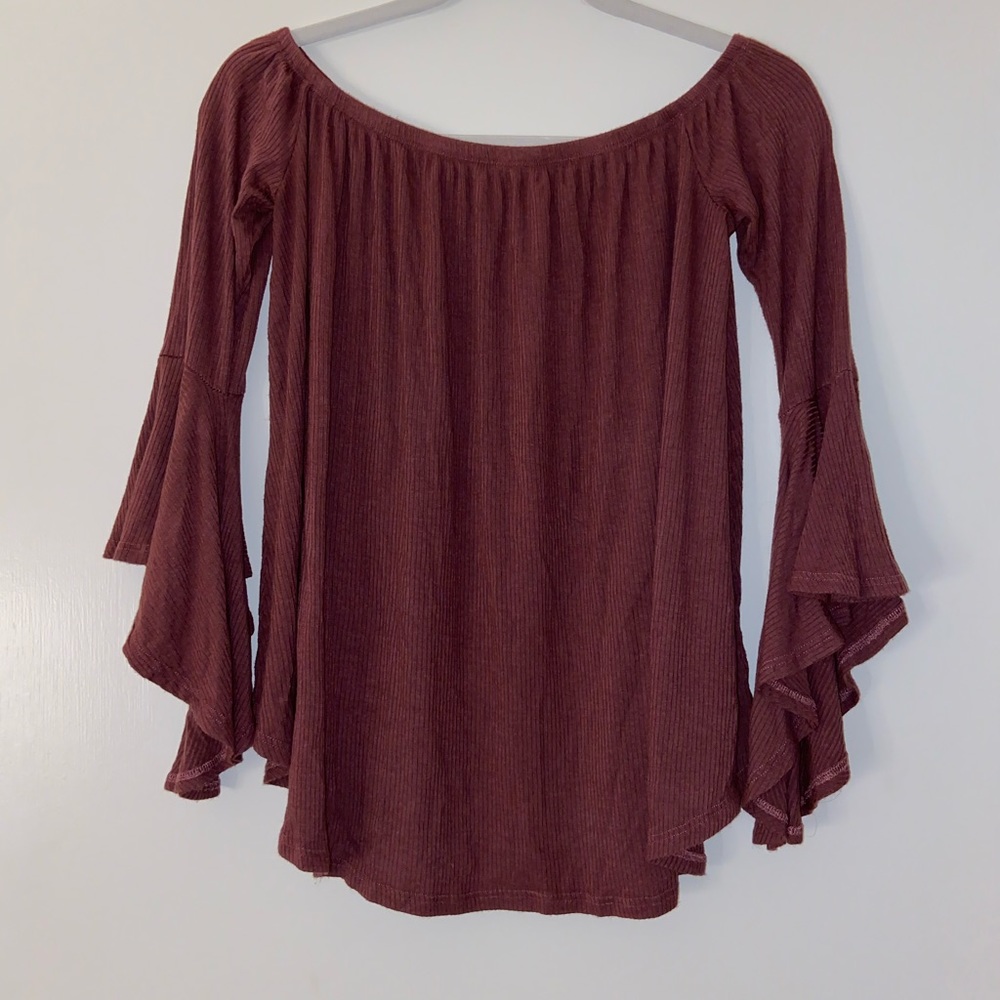 Beautiful off the shoulder, long sleeve shirt.